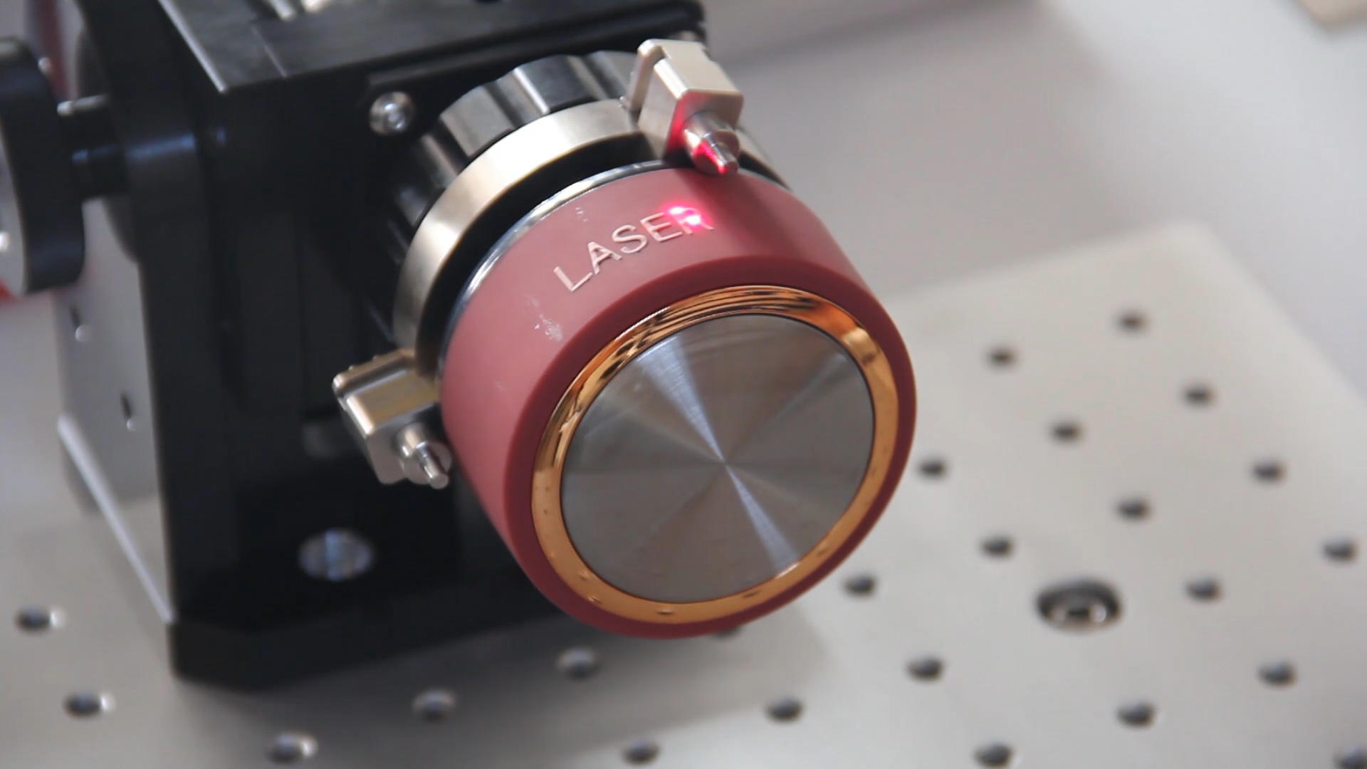 Mini laser marking machine marking stainless steel cup lid